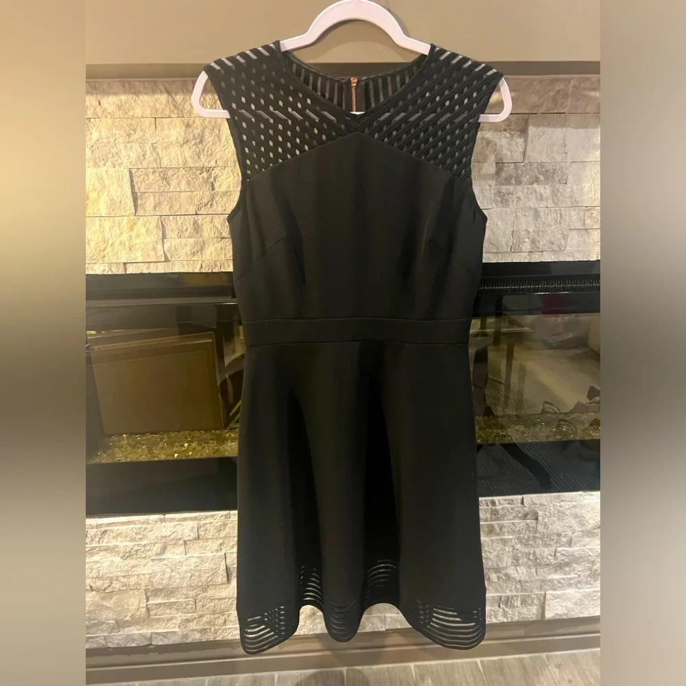 Tahari by Arthur Levine size 6 black cutout A-Line dress